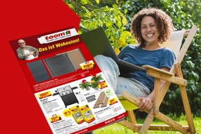 Werbeprospekt mit Angeboten, im Hintergrund eine Person im Liegestuhl.